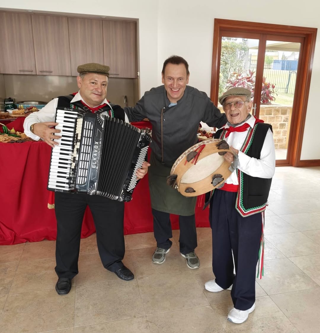 Giancarlo Ursino and Tony with a chef at a birthday party