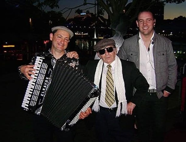 Giancarlo Ursino and Tony posing together at Darling Harbour