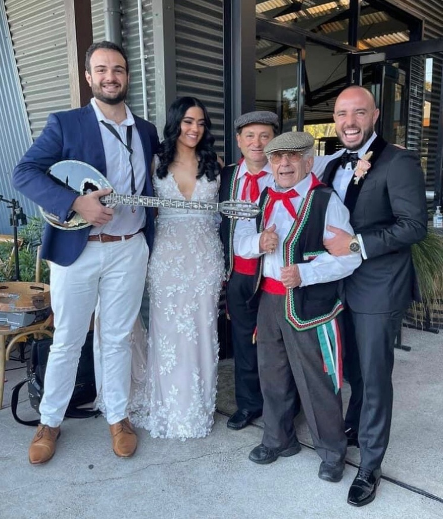 Wedding reception with live music at an outdoor venue